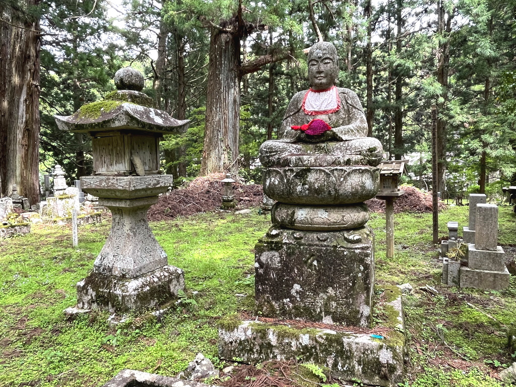 Jizō statue, red bibs